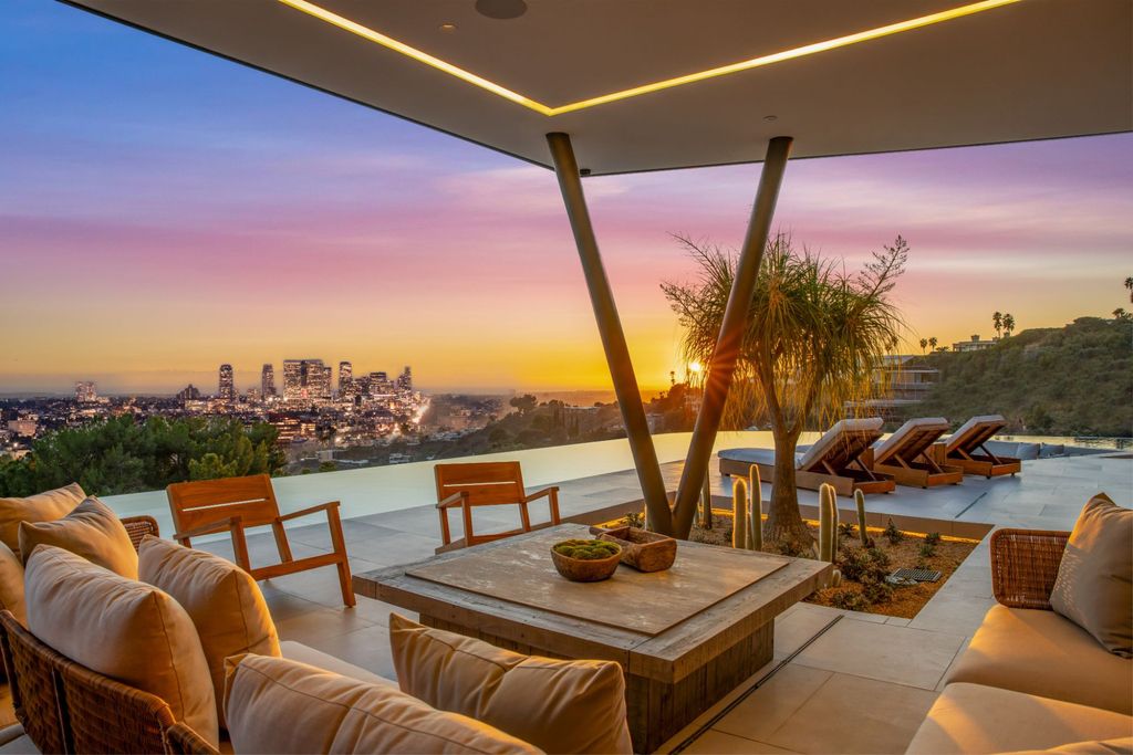 1680 N Doheny Drive Home in Los Angeles, California. Step into luxury with this just-completed 13,500 SF contemporary masterpiece in the exclusive Bird Streets above the Sunset Strip. Designed by Vantage Design Group, this concrete and steel construction home offers panoramic views and high fire resistance.