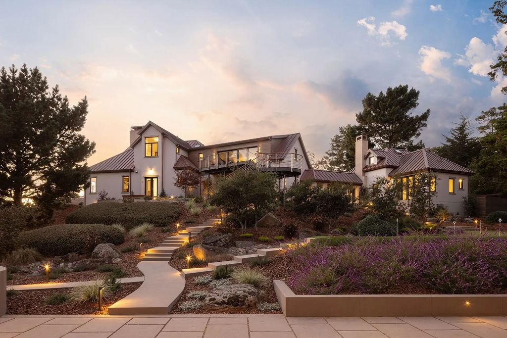 3225 Macomber Drive Home in Pebble Beach, California. Discover the epitome of opulence in this architectural masterpiece near Pebble Beach Resorts. Recently renovated, the property boasts 3.16 acres of meticulously landscaped grounds, offering breathtaking views of Carmel Bay and the Pacific. 