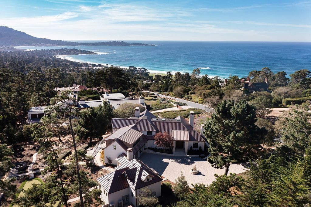 3225 Macomber Drive Home in Pebble Beach, California. Discover the epitome of opulence in this architectural masterpiece near Pebble Beach Resorts. Recently renovated, the property boasts 3.16 acres of meticulously landscaped grounds, offering breathtaking views of Carmel Bay and the Pacific. 