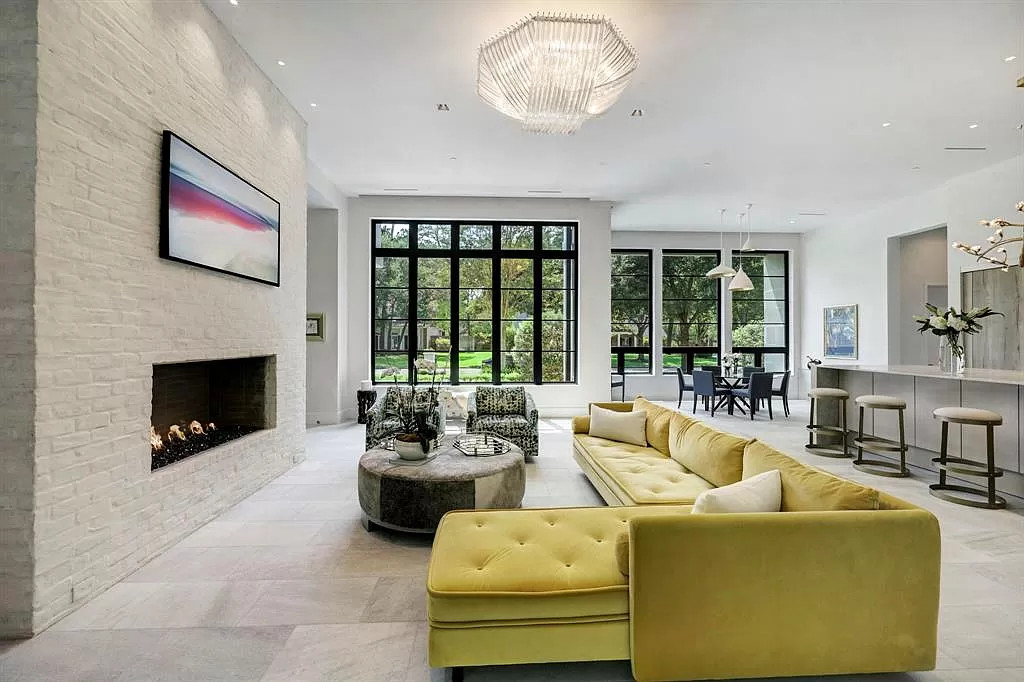 Sophisticated Retreat: 5-Bed Home in Houston with Dual Kitchens & Wine Vault, Exclusive at $5.2M