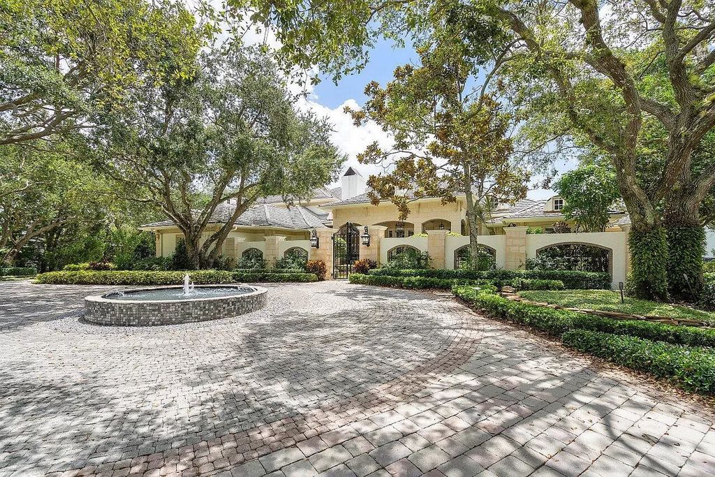 Discover the epitome of luxury living at 7894 Dunvagen Ct, a newly renovated masterpiece within Boca Raton's prestigious St. Andrews Country Club.