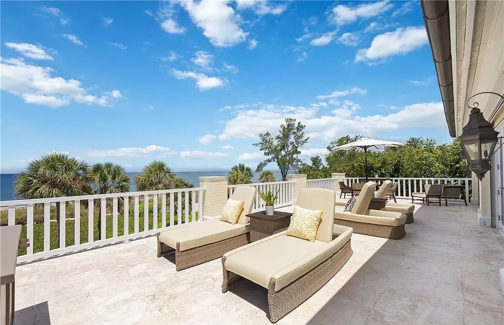 Nestled in the prestigious Sanderling Club on Siesta Key, 8218 Sanderling Rd presents an unparalleled beachfront estate offering opulence, privacy, and natural beauty. With 300 feet of beachfront on 3.64 acres, the primary residence boasts over 8,600 square feet, capturing panoramic Gulf of Mexico views.