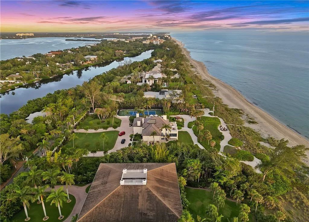 Nestled in the prestigious Sanderling Club on Siesta Key, 8218 Sanderling Rd presents an unparalleled beachfront estate offering opulence, privacy, and natural beauty. With 300 feet of beachfront on 3.64 acres, the primary residence boasts over 8,600 square feet, capturing panoramic Gulf of Mexico views.