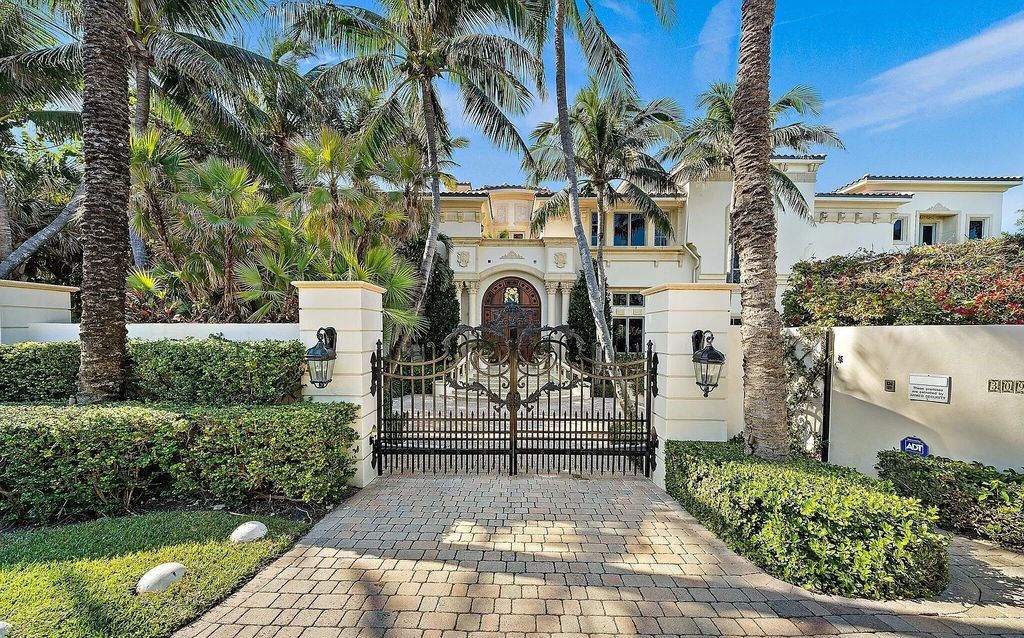 This fully furnished, 7-bedroom estate spanning 1.72 acres in Manalapan, Florida, redefines luxury living