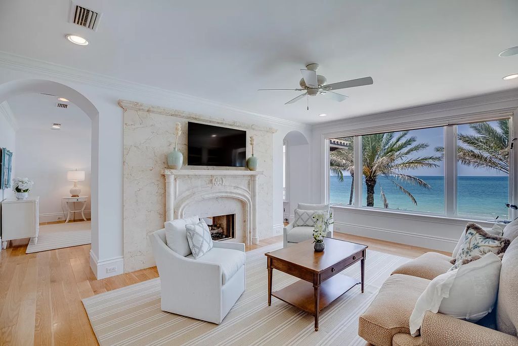Nestled along the picturesque shores of Vero Beach, this beachfront masterpiece embodies coastal luxury. With breathtaking ocean panoramas, a two-level office/library, chef's kitchen, and a dreamy master suite, this home exudes sophistication.