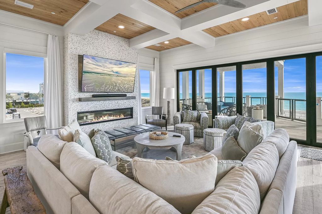 Built in 2020, this Gulf-front property offers breathtaking views from all four levels, showcasing the white sands and emerald waters.