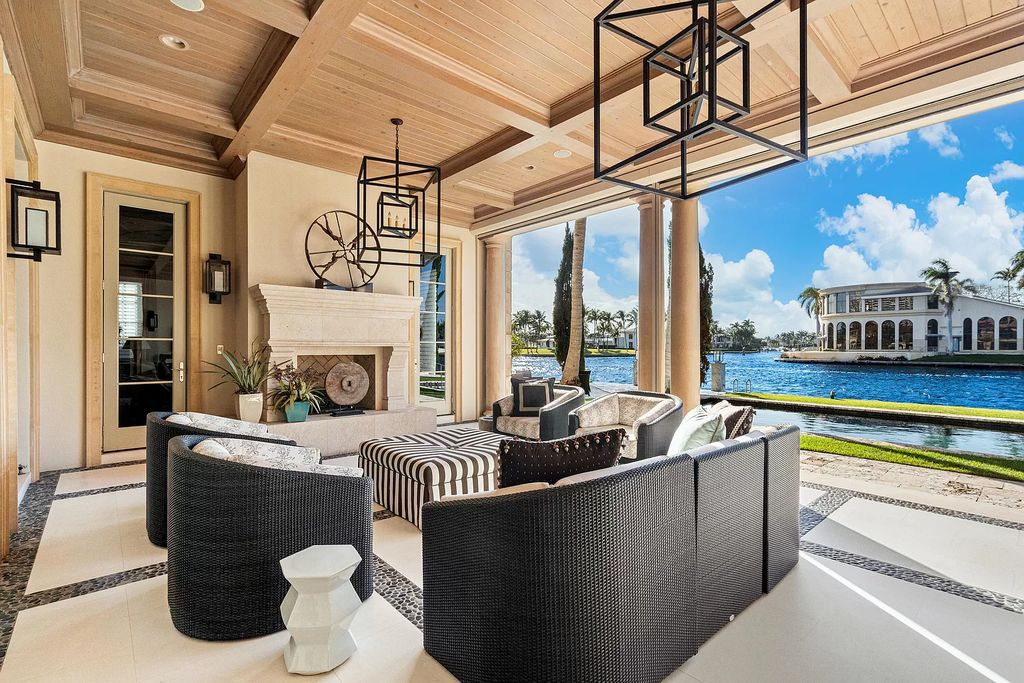 Crafted by Frankel Estate Homes, designed by Carlos Martin Architects, and styled by Marc-Michaels, this 6-bedroom, 10-bathroom mansion showcases an elegant staircase, grand salon, modern kitchen, and a lavish primary suite with waterfront vistas.