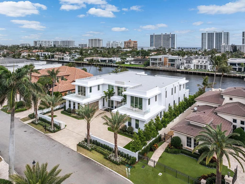 This waterfront haven boasts 6 beds, 9 baths (7 full, 2 half), and a spacious 8,921 square feet living space. Positioned on a premier Intracoastal lot, the property provides stunning water views, a private dock, and 104' of waterfrontage.
