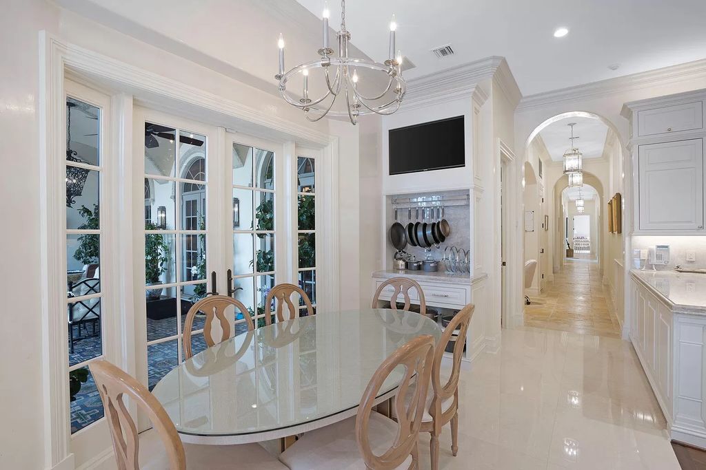 Built in 2010, this 1.61-acre estate features 150 feet +/- of both Ocean and Intracoastal frontage. With 9 bedrooms, 14 bathrooms, and 13,349 square feet of meticulously designed living space, this residence is a masterpiece of sophistication.