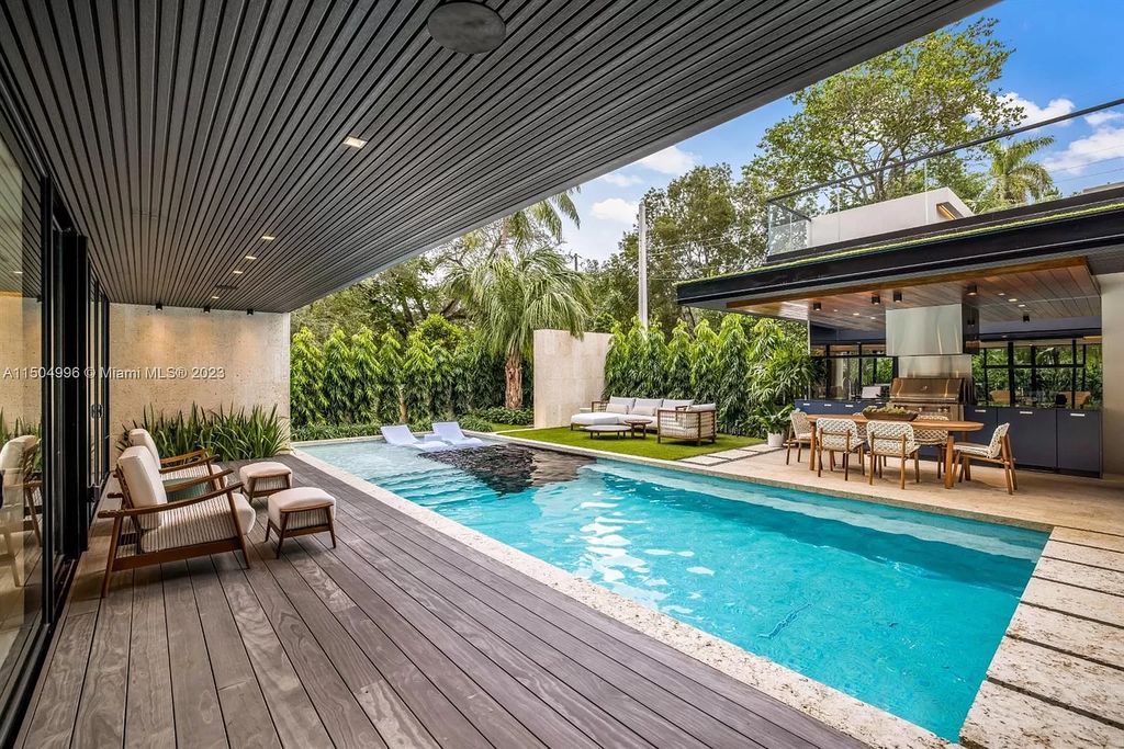 Discover the epitome of tropical luxury living at the Sir Crawford residence in Miami, perfectly situated near top schools and Grove amenities.