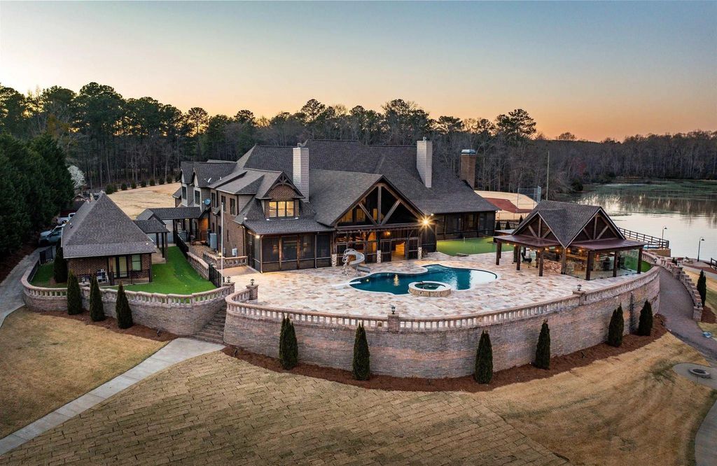 1 Lake Forest Lane Home in Wilsonville, Alabama. Prepare to be enchanted by this truly unique property situated on 8.6 acres of picturesque Lay Lake shoreline. Boasting breathtaking views and an array of extraordinary features, this house offers a lifestyle of unparalleled luxury.