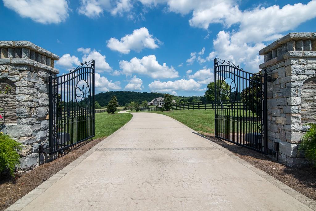 This stunning 20-acre gated estate is in the coveted and bucolic community of Leiper’s Fork in Williamson County. The grand entry features soaring 23-foot ceilings, marble floors and double sweeping staircases. It’s high drama teamed with luxurious beauty. The home has four bedrooms, six full and three half-baths. 3320 Southall Rd, Franklin, TN.