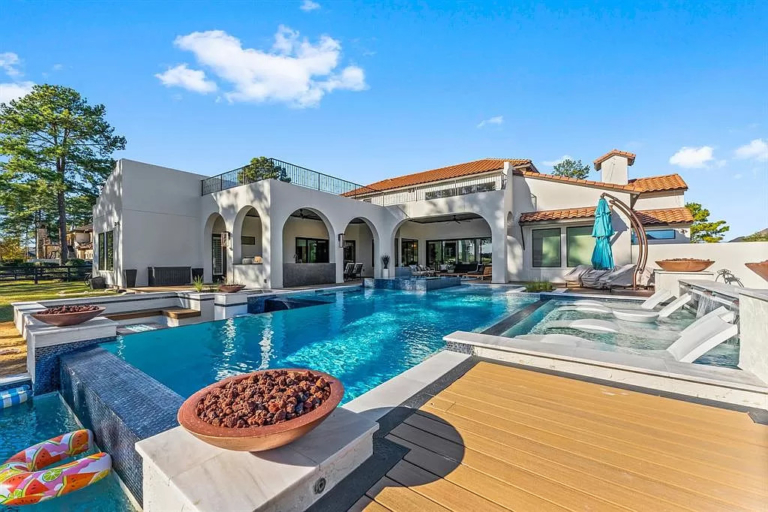 Indulge in Luxury Living: Modern Oasis in Tomball, TX with Tasting Room and Rooftop Sundeck, Priced at $2.15M