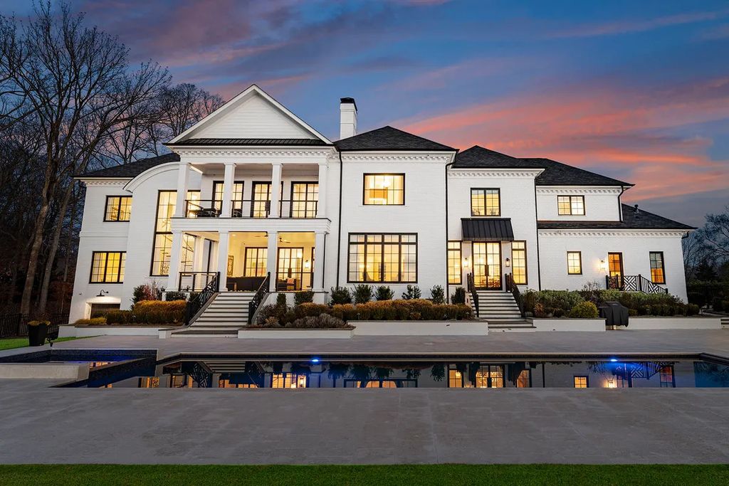 7214 Baltusrol Lane Home in Charlotte, North Carolina. Discover unparalleled luxury living at "Satisfaction In Charlotte," a meticulously renovated estate offering breathtaking views of Quail Hollow's premier golf course. This turn-key home boasts top-to-bottom renovations by Peters Custom Homes, including a culinary masterpiece kitchen, indulgent primary suite with private balcony, and seamless indoor-outdoor living spaces perfect for entertaining.