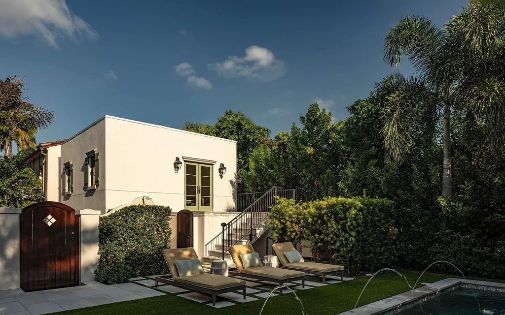 Discover luxury living at 323 Chilean Avenue, an impeccably re-imagined masterpiece in the tranquil heart of Palm Beach Town.