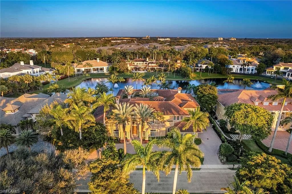 Welcome to the epitome of luxury living at 7310 Tilden Ln in Bay Colony Shores, Naples, Florida. This magnificent estate boasts over 10,000 square feet of meticulously crafted living space, featuring 6 palatial bedrooms with en-suite bathrooms, two additional half baths, and exquisite architectural details throughout.