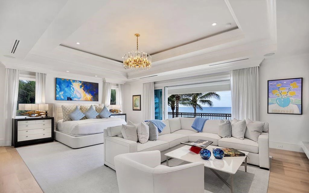 Welcome to 1040 S Ocean Blvd, Manalapan, Florida – an extraordinary ocean-to-Intracoastal compound showcasing 200 feet of ocean frontage and a private dock across Ocean Boulevard. This exquisite estate, built in 2018, spans 16,430 square feet across 2.14 acres, offering 8 bedrooms, 15 bathrooms, and a host of luxurious amenities.