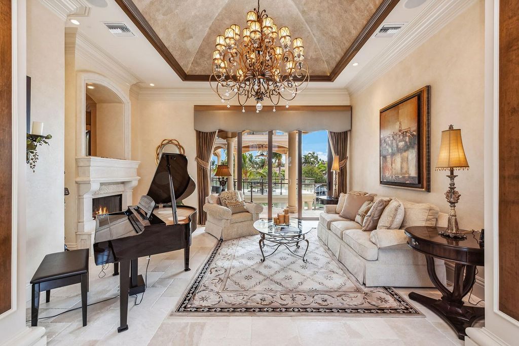 Indulge in the pinnacle of luxury living at this prestigious Marco Island residence in the Estates