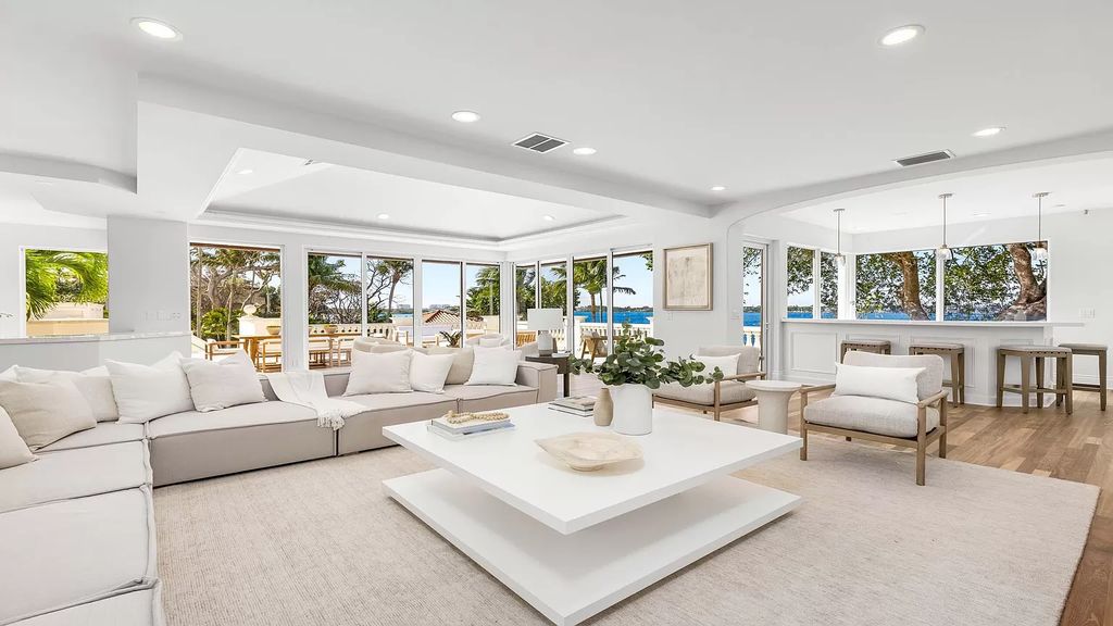 Presenting an extraordinary opportunity along 1840 S Ocean Blvd in Manalapan, Florida, this recently updated Ocean-to-Intracoastal compound offers luxurious waterfront living on nearly two acres of prime real estate.