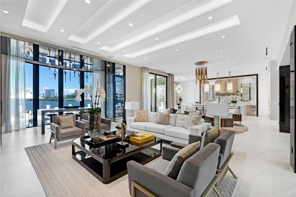 Experience the pinnacle of luxury living in this newly completed custom smart home nestled along 100 feet of ocean access in Fort Lauderdale's esteemed Seven Isles community.