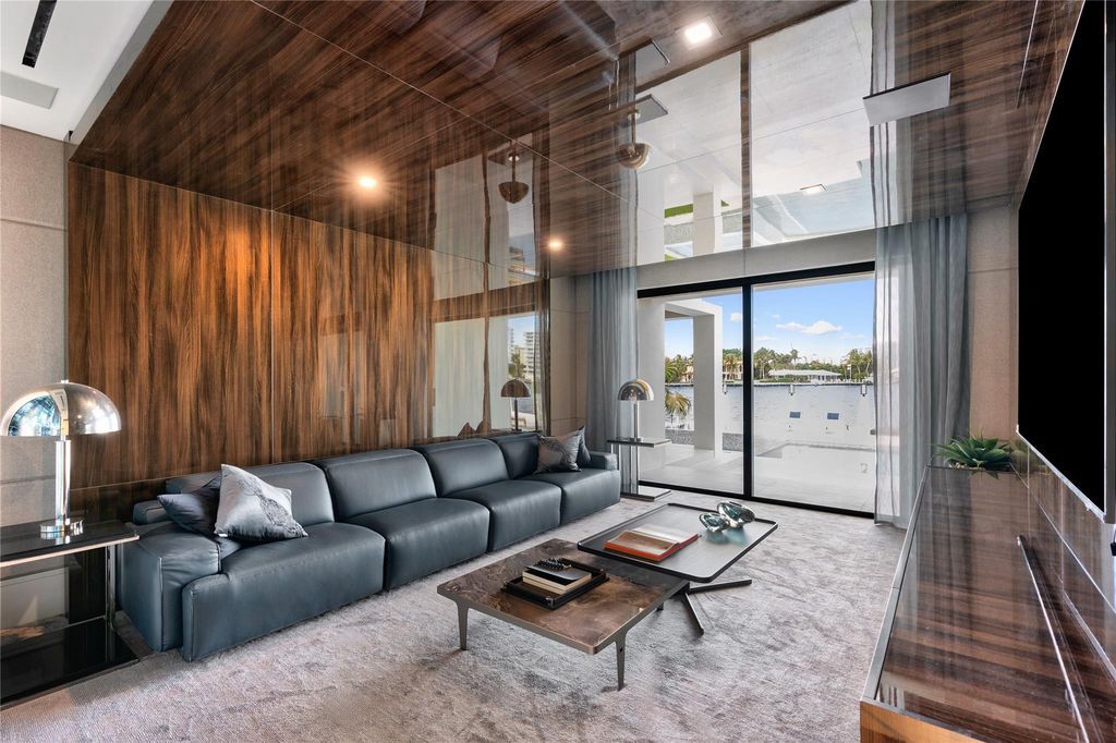 Experience the pinnacle of luxury living in this newly completed custom smart home nestled along 100 feet of ocean access in Fort Lauderdale's esteemed Seven Isles community.