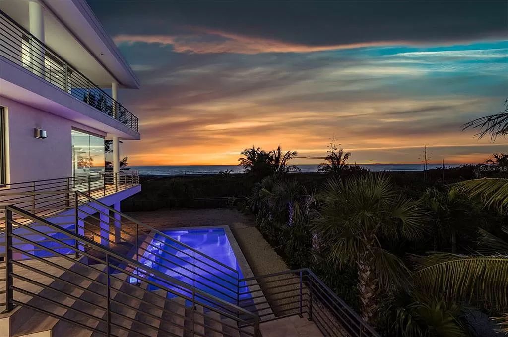 Indulge in the ultimate coastal lifestyle at Sunset Dream, an exquisite 7163-square-foot beach mansion on Anna Maria Island, Florida.