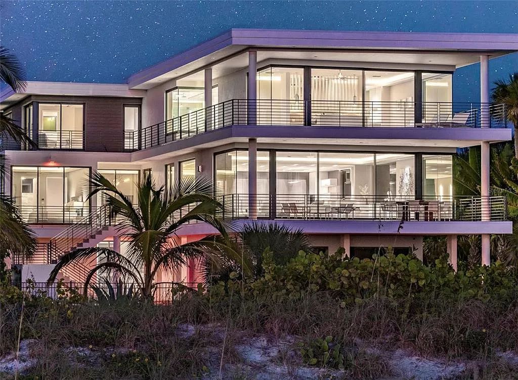 Indulge in the ultimate coastal lifestyle at Sunset Dream, an exquisite 7163-square-foot beach mansion on Anna Maria Island, Florida.