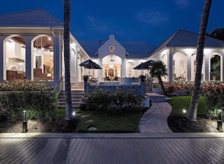 Timeless Elegance and Unrivaled Waterfront Living: Opulent $12.5 Million Coastal Estate in Naples
