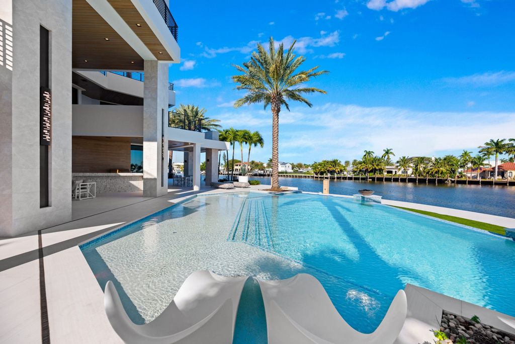200 Fiesta Way Home in Fort Lauderdale, Florida.  Experience unparalleled luxury living in this stunning coastal modern residence offering breathtaking views and 258+/- ft of protected deep water dockage. 