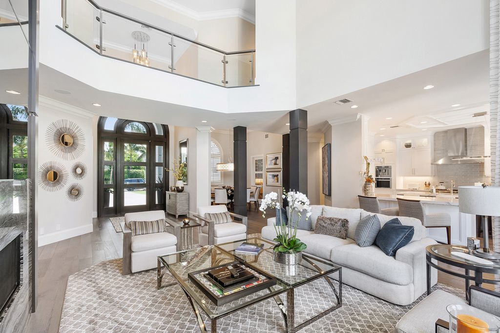 311 Fan Palm Road Home in Boca Raton, Florida. Discover contemporary elegance in this 5-bedroom golf course home at 311 Fan Palm Road, meticulously renovated to showcase brand new construction. Located in the esteemed Royal Palm Yacht & Country Club.