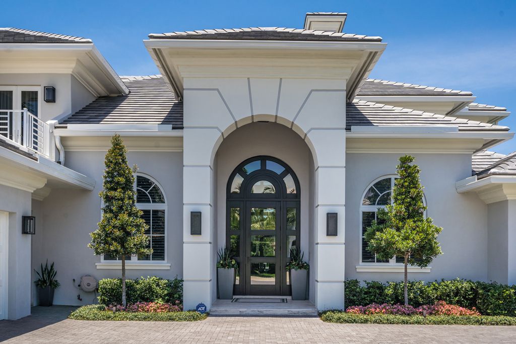 311 Fan Palm Road Home in Boca Raton, Florida. Discover contemporary elegance in this 5-bedroom golf course home at 311 Fan Palm Road, meticulously renovated to showcase brand new construction. Located in the esteemed Royal Palm Yacht & Country Club.