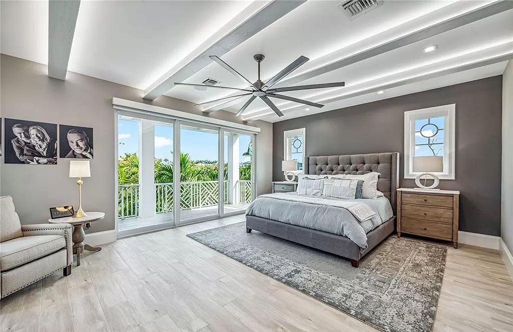 Discover unparalleled luxury in the prestigious Hideaway Beach community at 865 Sea Dune Ln, a meticulously crafted architectural masterpiece on one of the largest lots in the area.