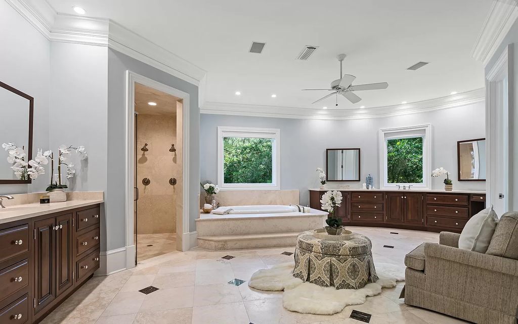 Welcome to riverfront luxury at 6120 SAN JOSE Boulevard W in Jacksonville, FL! This 3.7-acre estate boasts 243 feet of river frontage and a high bluff property adorned with oak trees.