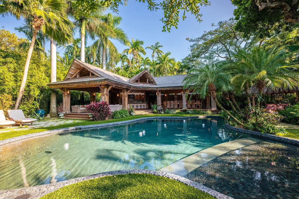 Nestled behind modest gates, 908 Fleming Street in Key West, Florida, unveils a world of unparalleled luxury and tranquility.
