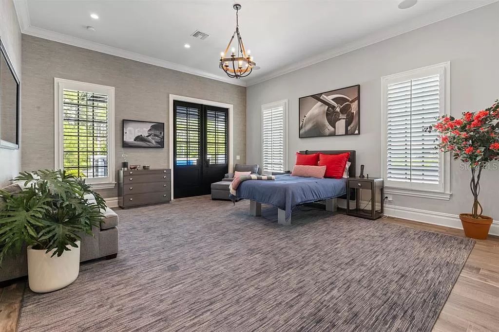 Discover luxury living at its finest in Disney's Golden Oak enclave with this exquisite nearly new residence nestled within the Four Seasons Private Residences neighborhood.