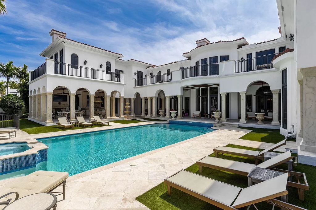 Experience the epitome of luxury living at 251 W Coconut Palm Road in Boca Raton's prestigious Royal Palm Yacht & Country Club.