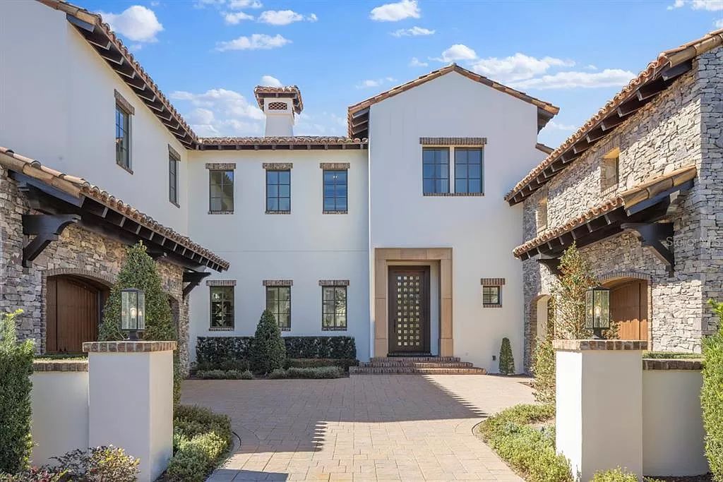 Nestled within the exclusive Silverbrook enclave of Golden Oak at the Walt Disney World Resort, 9714 Vista Falls Drive epitomizes luxury Florida living.