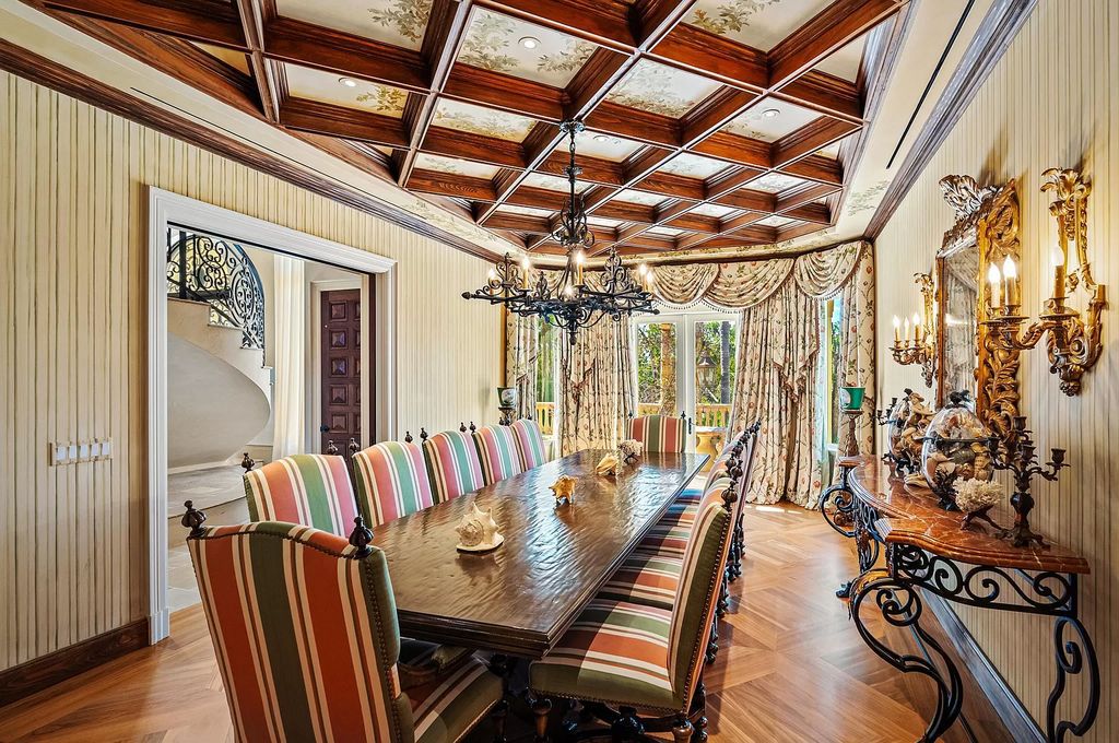 Nestled along the shores of Manalapan, Florida, this opulent ocean-to-Intracoastal estate epitomizes luxury living. Rebuilt in 2001, the Mediterranean gem boasts exquisite craftsmanship and fine finishes throughout.