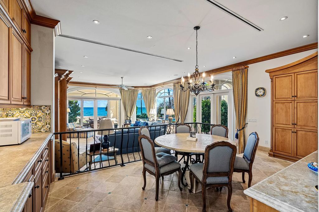 Nestled along the shores of Manalapan, Florida, this opulent ocean-to-Intracoastal estate epitomizes luxury living. Rebuilt in 2001, the Mediterranean gem boasts exquisite craftsmanship and fine finishes throughout.