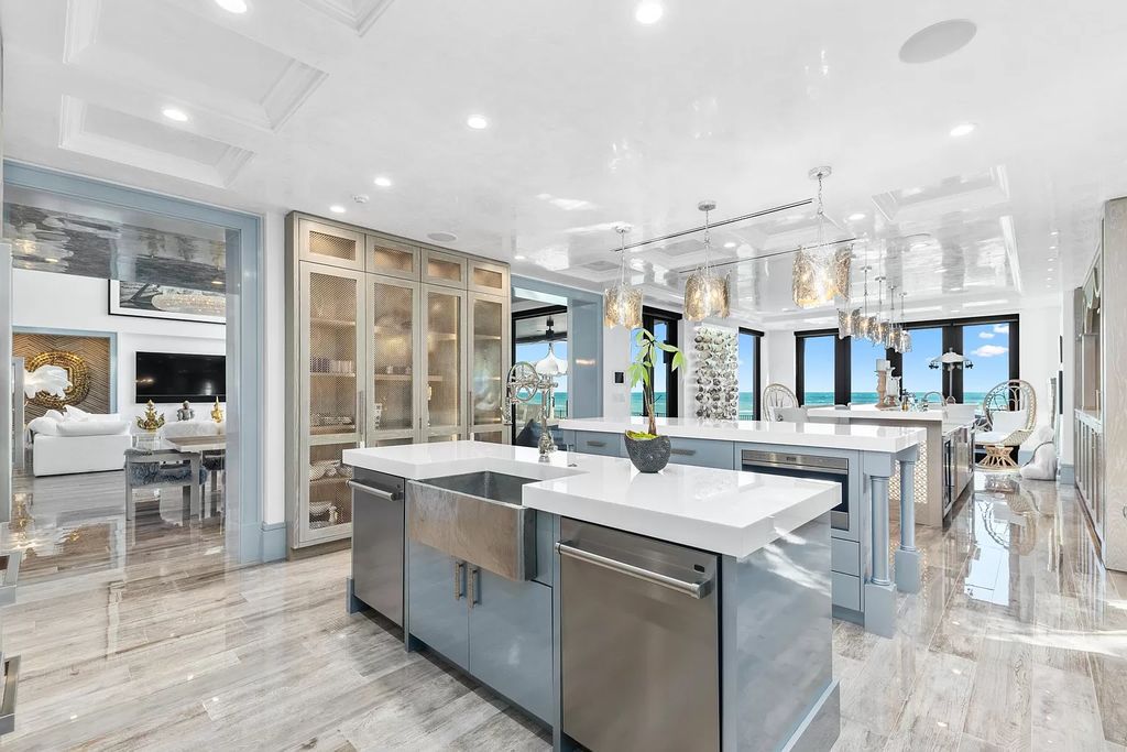 Welcome to 14 Ocean Dr, Jupiter Inlet Colony, FL 33469, where coastal luxury meets modern elegance. This completely renovated direct oceanfront home offers a seamless blend of transitional style and impeccable craftsmanship.