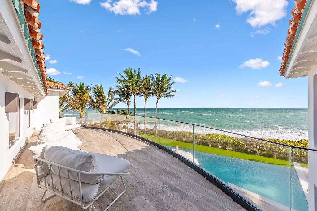 Welcome to 14 Ocean Dr, Jupiter Inlet Colony, FL 33469, where coastal luxury meets modern elegance. This completely renovated direct oceanfront home offers a seamless blend of transitional style and impeccable craftsmanship.