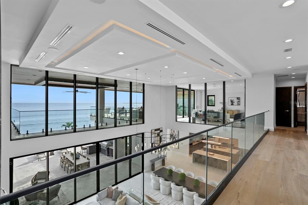 Welcome to 1721 Brightwaters Blvd NE, a stunning modern masterpiece in St. Petersburg's exclusive Snell Isle neighborhood. This completed new construction offers 6 bedrooms, 7 full baths, and 2 half baths across 7,087 square feet of luxurious living space, with 100 feet of waterfrontage overlooking Tampa Bay.