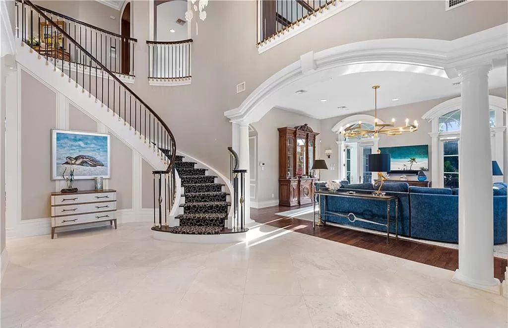 Nestled just 99 steps from the beach, 40 5th Ave S in Naples, Florida, embodies coastal luxury living with its exquisite "Neo Classical" style architecture influenced by Italy, Spain, France, and England.
