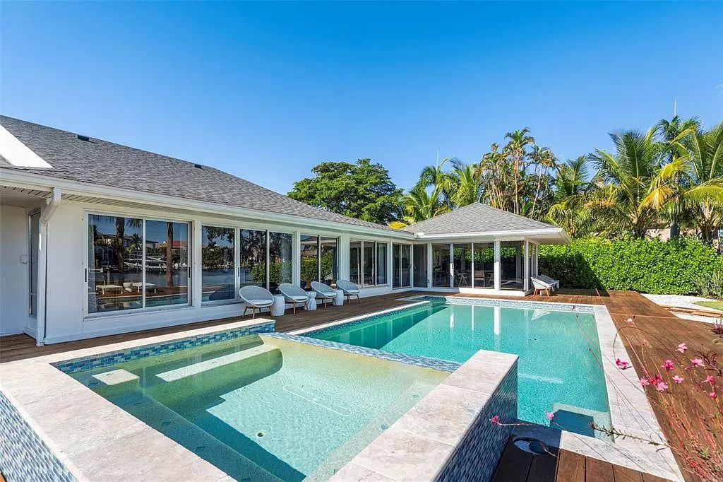 Welcome to 1449 Hillview Dr, Sarasota, Florida, a waterfront oasis in the coveted Harbor Acres Estate Section.