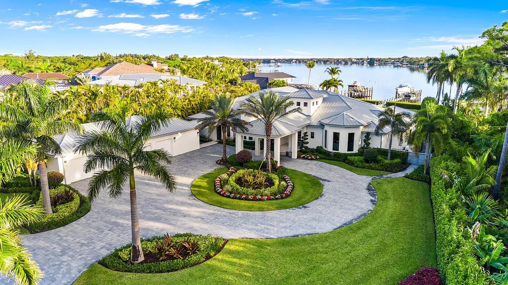 Nestled on the scenic Loxahatchee River, this 5-bedroom, 6-bathroom estate in Jupiter, Florida offers the epitome of luxury living.