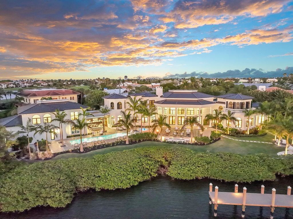 Experience unparalleled waterfront luxury at 6440 SE Harbor Cir, Stuart, FL 34996, where this architectural masterpiece stands as a testament to refined living. With 270 feet of coastline in Sailfish Point, this private island retreat offers easy ocean access via a new 800 sq ft deep water dock, inviting you to embrace a lifestyle of aquatic adventures and breathtaking sunsets.