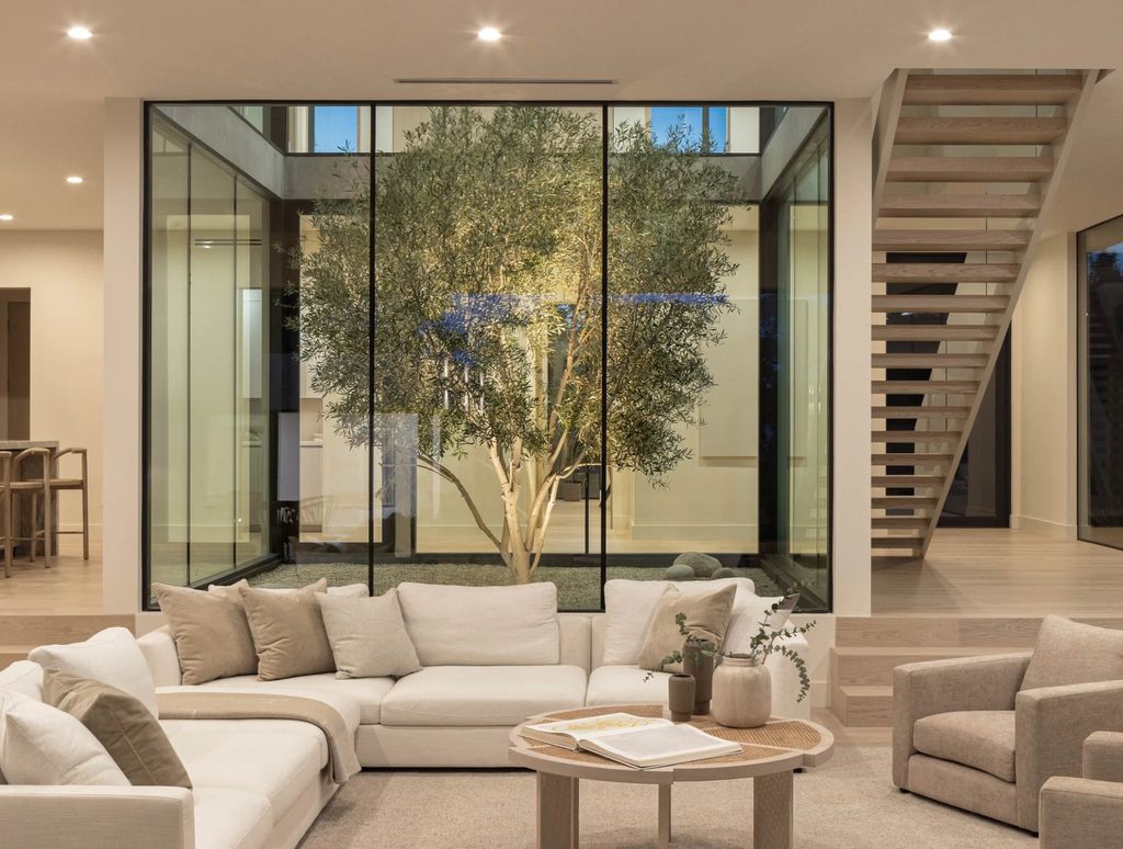 11964 Modjeska Place Home in Los Angeles, California. Explore the unparalleled luxury of The Atrium House, a newly constructed home by Wylan/James in Mar Vista. Boasting 4 bedrooms, 4 baths, and an office/gym.
