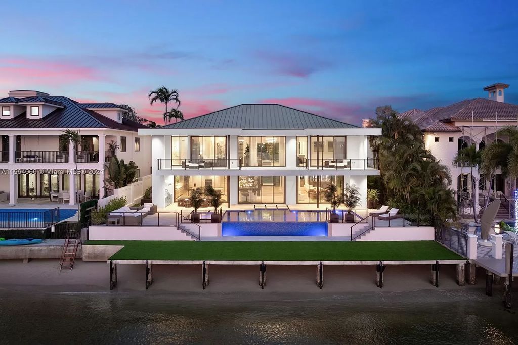 Experience unparalleled luxury living in this newly constructed modern waterfront estate located in Fort Lauderdale. With a Certificate of Occupancy issued and available turnkey, this stunning property boasts enchanting views of the intracoastal, ocean inlet, and passing cruise ships and yachts.