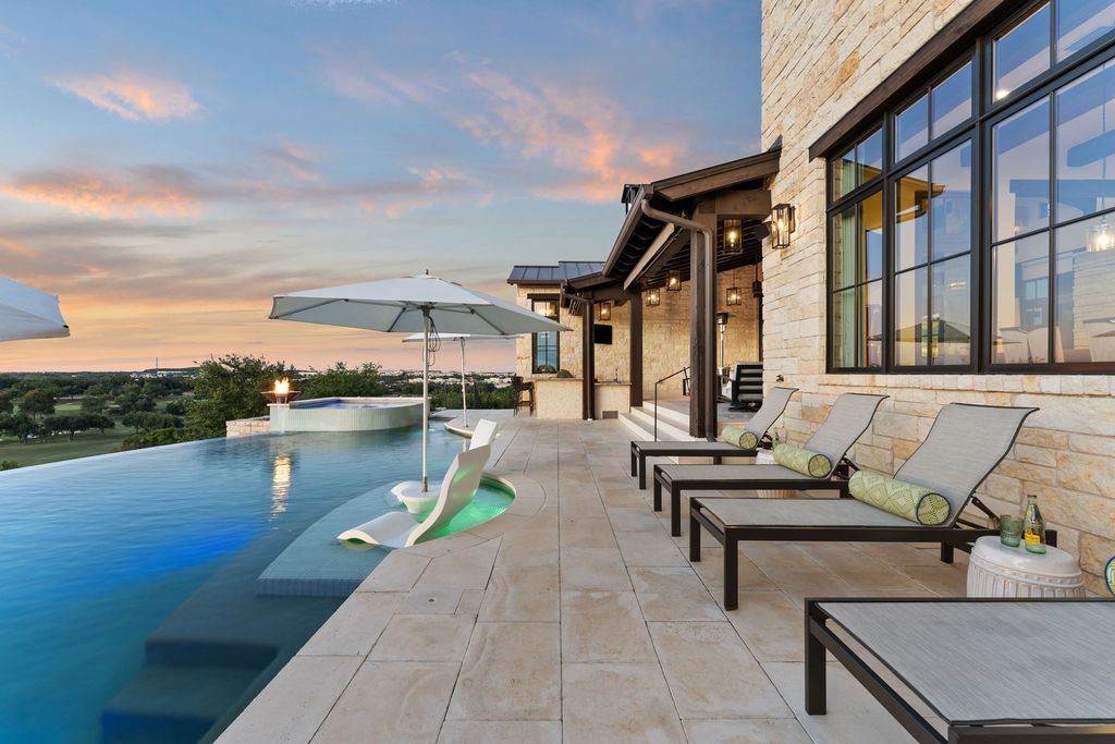 12625 Maidenhair Lane Home in Bee Cave, Texas. Discover this stunning 5703 sq. ft. property in the prestigious Spanish Oaks Golf Course community, offering panoramic hill country views and unparalleled exclusivity.