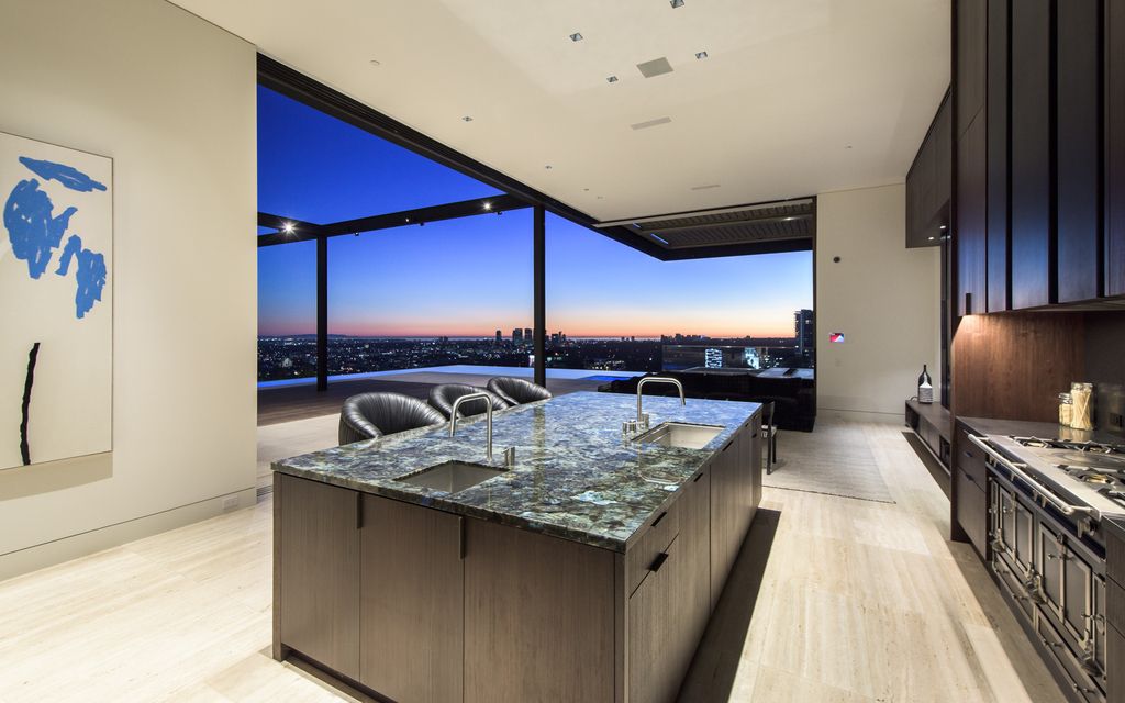 1305 Collingwood Place Home in Los Angeles, California. Experience luxury living at its finest in this sophisticated 6-bedroom, 8-bathroom compound nestled in the Hollywood Hills. With expansive living spaces, stunning panoramic views from Downtown LA to the Pacific Ocean. 